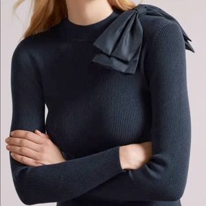 Ambher
Extravagant Bow Jumper